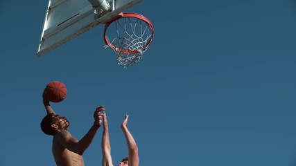 Super slow motion shot of basketball basketball slam dunk, shot on Phantom Flex  - Powered by Adobe