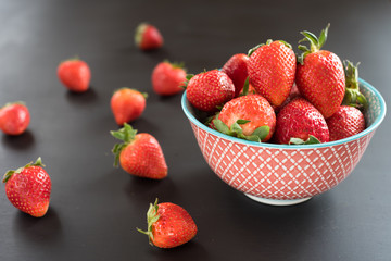 Ripe red strawberries in bowl . Fresh juice strawberry, healthy berry food photo