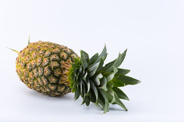 Fresh ripe whole pineapple isolated on white background