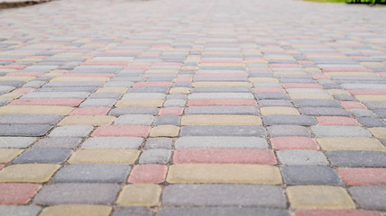 Fototapeta premium Background, texture of urban multicolored pavers on the whole frame. Horizontal frame