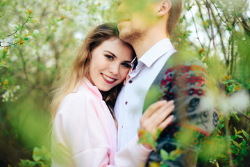 Romantic happy loving couple on nature in spring