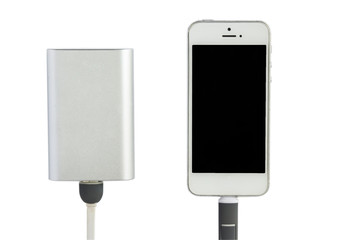 Charging smartphone with grey portable external battery ( power bank ) isolated on a white background