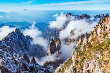 Acrylic prints Huangshan Clouds above the peaks of Huangshan National park.