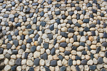 Muro de piedra de canto rodado.