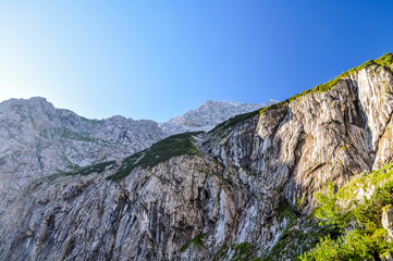 View up to Zugspitze (2962m above sea level), Germany's highest mountain, seen from Höllental, a beautiful valley hike to the summit of the mountain.