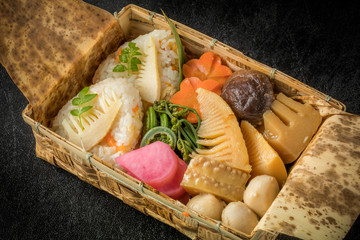 お弁当　Lunch box of a bamboo shoot and rice ball