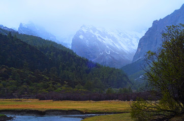 Yading and its evening mist