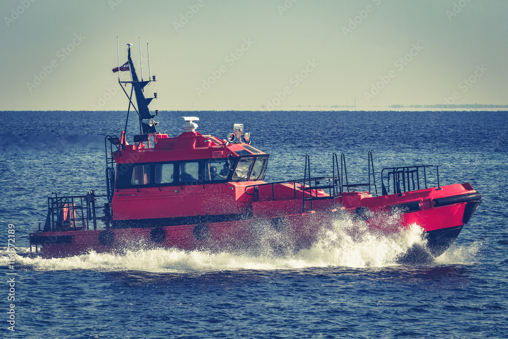 Wall mural Red pilot boat