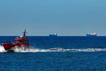 Red pilot boat