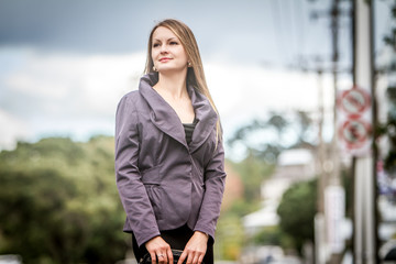 outdoor portrait of young gorgeous lady, woman in city, urban casual lifestyle shot