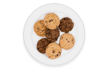 Chocolate chip cookies on plate on white background.