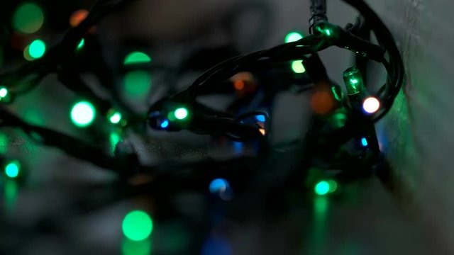 Christmas garland lightbulbs. Bokeh effect. Christmas and New Yaer decoration. Close up