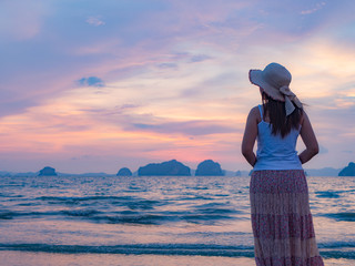 Fototapeta premium Lonely young woman on the beach,sad concept.