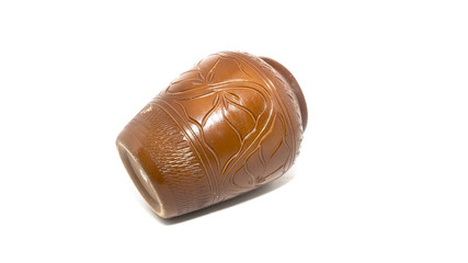Color photo of an old ceramic pot on isolated