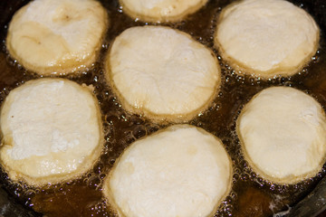 Belyashi in a frying pan