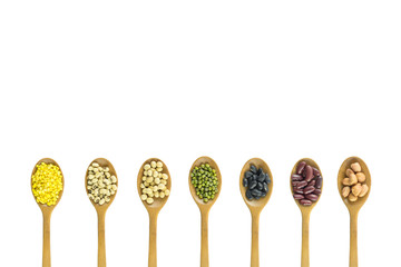 Mixed beans on wood spoon background isolated white background.