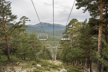 Chairlift in El Bosque ski slope, in Guadarrama Mountains National Park, province of Segovia, Spain