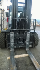 Forklift truck in the industrial cargo port. Service vehicles