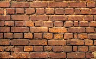 Vintage weathered red brick wall for background content