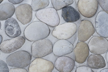 Gravel floor with many colors in many sizes. Walkway. Garden path.

