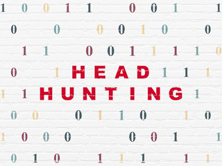 Business concept: Head Hunting on wall background