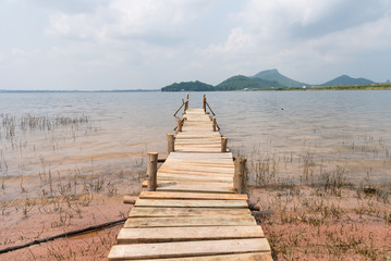 Summer time at the wooden pier in a lake