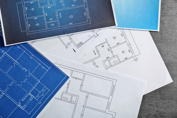 Different blueprints on table