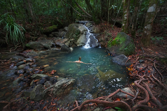 Woman in nature,pond at the jungle