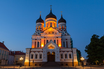 Fototapeta na wymiar Alexander Nevsky Orthodox Cathedral at night. Illuminated church and deep blue sky.