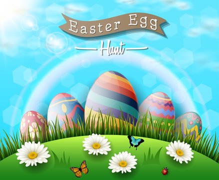 Happy easter eggs with flowers and butterfly on grass background