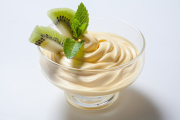 cold dessert decorated with slices of kiwi