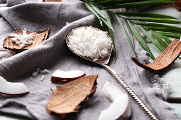 Beautiful composition with coconut shavings on table