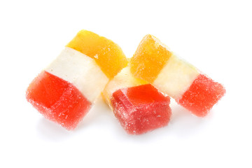 Tasty marmalade candies on white background