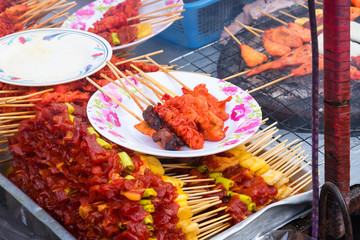 Chick internal organs was selected to the dish for grilled on the charcoal stove at Sattahip market, Chon Buri,Thailand.Delicious local food.Street food of Thailand.