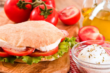 Puccia bread with mozzarella and tomato.