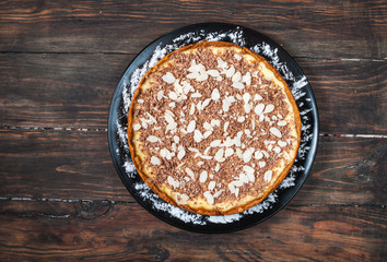 Homemade cheesecake - healthy organic summer dessert pie cheesecake. Cheese cake on wood