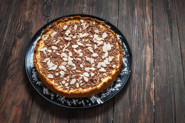 Homemade cheesecake - healthy organic summer dessert pie cheesecake. Cheese cake on wood table