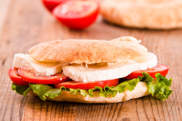 Puccia bread with mozzarella and tomato.