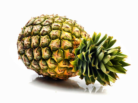 ripe pineapple is tropical fruit on white background