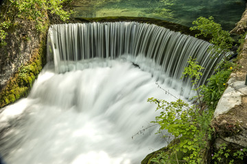 Semicircular dam that cause waterfall