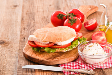 Puccia bread with mozzarella and tomato.