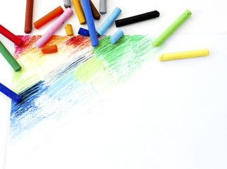 Oil pastels  crayons colorful art drawing on white paper background.