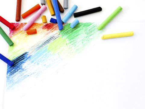 Oil pastels  crayons colorful art drawing on white paper background.