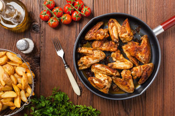 Baked wings, served with dip or baked potatoes.