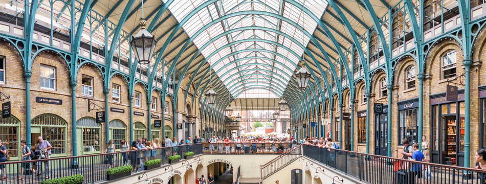 LONDON - JUNE 2013: People In Covent Garden. London Is Visited By 30 Million People Annually