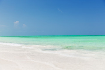 Fototapeta na wymiar sea and sky on exotic tropical beach