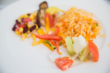 vegetable salad and garnish on plate