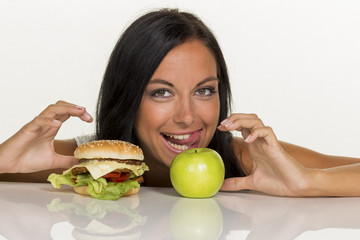 choosing between hamburger and apple