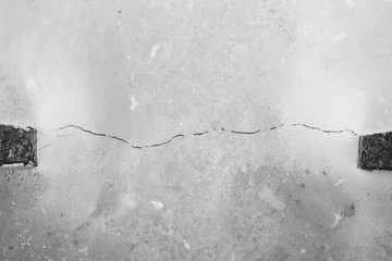 Crack in cement floor from shrinkage of house