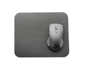 Modern wireless mouse and pad on white background